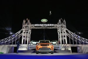 SOLIHULL, ENGLAND - SEPTEMBER 27:  Bear Grylls poses as he places the final piece on a Lego structure of Tower Bridge, during the launch of Land Rover's 'New Discovery' at Packington Hall on September 27, 2016 in Solihull, England. Land Rover revealed their brand new Discovery with the help of ambassadors Zara Phillips, Bear Grylls and Sir Ben Ainslie against the backdrop of the replica of London’s Tower Bridge, made entirely from Lego. The structure broke the Guinness World Record for the greatest number of Lego bricks used in a sculpture with over 5.8 million pieces.  (Photo by Dan Kitwood/Getty Images for Land Rover) *** Local Caption *** Bear Grylls