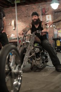 Chris "Rock Hard" Volk posing for camera.